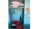 Bright storage closet with cleaning supplies, linens, ironing board, and beach accessories at 6803 N Ocean Blvd. # 210, Myrtle Beach, SC 29572