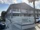 View of accessible building exterior with ramp, featuring neutral colors and outdoor access at 6803 N Ocean Blvd. # 210, Myrtle Beach, SC 29572
