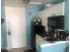Functional kitchen with white cabinets, black appliances, and a compact design at 6803 N Ocean Blvd. # 210, Myrtle Beach, SC 29572