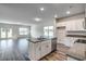 Modern kitchen features granite countertops, stainless steel appliances, and an island with a sink at 109 Arrow Wood Dr, Conway, SC 29526
