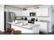Modern kitchen with stainless steel appliances, granite counters, and white cabinetry at 109 Arrow Wood Dr, Conway, SC 29526