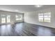 Bright living room offers a comfortable and inviting space with large windows and doors at 109 Arrow Wood Dr, Conway, SC 29526