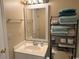 Bathroom featuring a vanity with a mirror, a toilet, and storage shelves for towels and toiletries at 1095 West Plantation Dr. # 28-I, Little River, SC 29566