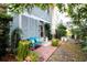 Private backyard patio with a blue cushioned seating area and brick-paved surface at 2256 Heritage Loop # 2256, Myrtle Beach, SC 29577