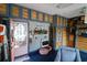 Finished garage with custom cabinets, seating area, and refrigerator at 2256 Heritage Loop # 2256, Myrtle Beach, SC 29577