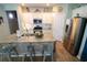 Bright kitchen features granite counters, stainless appliances and a spacious center island with barstool seating at 2256 Heritage Loop # 2256, Myrtle Beach, SC 29577