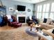 Cozy living room with modern farmhouse decor, fireplace, and comfortable seating at 2256 Heritage Loop # 2256, Myrtle Beach, SC 29577