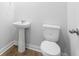 Bathroom with a pedestal sink, toilet and vinyl flooring at 2469 Campton Loop, Conway, SC 29527