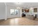 Open-concept kitchen with stainless steel appliances and center island at 2469 Campton Loop, Conway, SC 29527