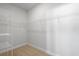 Spacious walk-in closet with carpet flooring and multiple wire shelving units for optimal storage at 2469 Campton Loop, Conway, SC 29527