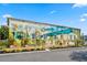 Exterior view of a charming building featuring a colorful 'Welcome to Conway' mural at 2480 Campton Loop, Conway, SC 29527