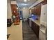 Kitchen with wood cabinets and laminate floors at 354 George Washington Trail, Georgetown, SC 29440