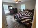 Bedroom with wood floors and a quilt on the bed at 354 George Washington Trail, Georgetown, SC 29440