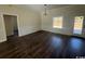 Spacious dining room featuring hardwood floors and wainscoting at 4646 Quiet Ave., Conway, SC 29527