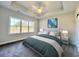 Comfortable bedroom with a tray ceiling, large windows, and plush carpeting for a cozy retreat at 4963 Old Highway 90, Conway, SC 29526