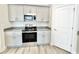 Well-equipped kitchen with stainless steel appliances, granite countertops, and plenty of storage space at 4963 Old Highway 90, Conway, SC 29526