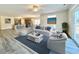 Spacious living area showcasing an open floor plan, stylish furniture, and plenty of natural light at 4963 Old Highway 90, Conway, SC 29526