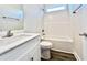 Well-lit bathroom with a sleek vanity, tub, and modern fixtures at 4971 Old Highway 90, Conway, SC 29526