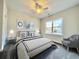 Cozy bedroom features a comfortable bed, natural light from the window, and a serene color scheme at 4971 Old Highway 90, Conway, SC 29526