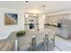Beautiful kitchen with granite countertops, stainless steel appliances, a large center island, and pendant lighting at 4971 Old Highway 90, Conway, SC 29526