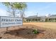 Water Oaks Conference Center exterior view featuring lush greenery and architectural details on a clear day at 100 Ocean Creek Dr. # L5, Myrtle Beach, SC 29572