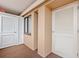 Hallway with doors and a window featuring neutral-toned walls and carpet at 100 Ocean Creek Dr. # L5, Myrtle Beach, SC 29572