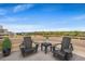 Enjoy this rooftop deck with seating and gorgeous views of the surrounding landscape at 100 Ocean Creek Dr. # L5, Myrtle Beach, SC 29572