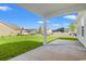 View from the back porch showing the home's lawn and neighboring houses at 1203 Cypress Shoal Dr., Conway, SC 29526