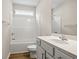 Bright bathroom showcases a vanity, toilet, shower, and sleek fixtures against wood-look flooring at 1203 Cypress Shoal Dr., Conway, SC 29526