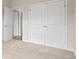 Bedroom features carpeted floors, neutral walls, and a double door closet for storage at 1203 Cypress Shoal Dr., Conway, SC 29526