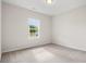 Cozy bedroom with natural light, carpeted floor, and view of neighborhood at 1203 Cypress Shoal Dr., Conway, SC 29526