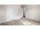 Bedroom featuring neutral walls, carpeted floors, and a double door closet for storage at 1203 Cypress Shoal Dr., Conway, SC 29526