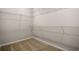 Walk-in closet with wire shelving provides ample storage and organization in a carpeted space at 1203 Cypress Shoal Dr., Conway, SC 29526