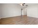 Large open living room with light hard wood flooring and ceiling fan at 1203 Cypress Shoal Dr., Conway, SC 29526