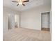 Large main bedroom with plush carpeting, neutral walls, and access to the main bathroom at 1203 Cypress Shoal Dr., Conway, SC 29526