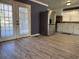 Dining area with hardwood floors and french doors leading to a deck at 209 Lewis St., Mullins, SC 29574