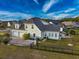 This aerial view showcases a well-maintained lot, backyard oasis, and long driveway at 2207 Wood Stork Dr., Conway, SC 29526
