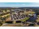 Scenic aerial view of the community featuring homes, golf course, lakes, and recreational areas at 2207 Wood Stork Dr., Conway, SC 29526