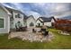 The outdoor firepit and kitchen create the ideal setting for entertaining in the backyard at 2207 Wood Stork Dr., Conway, SC 29526