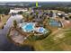 Overhead view of the neighborhood amenities, including a pool, tennis courts, and parking at 2207 Wood Stork Dr., Conway, SC 29526