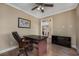 Comfortable office features hardwood floors, a modern desk, and a neutral color scheme at 2207 Wood Stork Dr., Conway, SC 29526
