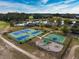 Aerial view of community sports complex with tennis and basketball courts, and a playground at 2207 Wood Stork Dr., Conway, SC 29526