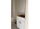 White single vanity with black hardware in a bathroom at 2682 Hugo Rd., Conway, SC 29527