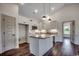 Beautiful kitchen with modern cabinets, countertops, stainless appliances, an island, and modern fixtures at 2682 Hugo Rd., Conway, SC 29527