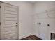Convenient laundry room with a utility sink and storage shelf at 2682 Hugo Rd., Conway, SC 29527