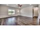 Spacious living room featuring wood floors, with large windows to provide natural light at 2682 Hugo Rd., Conway, SC 29527