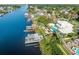 Stunning aerial view of a waterfront property with a private dock, pool, and lush landscaping at 3788 Waterford Dr., Myrtle Beach, SC 29577