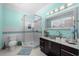 Modern bathroom featuring a glass-enclosed shower, elegant vanity, and contemporary fixtures in a bright and airy space at 3788 Waterford Dr., Myrtle Beach, SC 29577