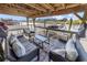 Covered boat dock featuring cushioned seating and beautiful waterfront views at 3788 Waterford Dr., Myrtle Beach, SC 29577