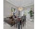 Dining room with a modern chandelier and elegant decor at 3788 Waterford Dr., Myrtle Beach, SC 29577